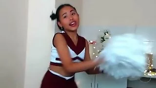 Young Cheerleader Asian....