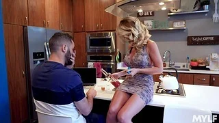 Stepson takes a shot from stepmom's boobies and fucks her cunt in the kitchen