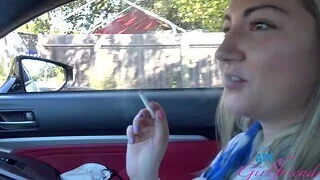 Amateur video of stranger Lily Adams smoking a cigar far the car